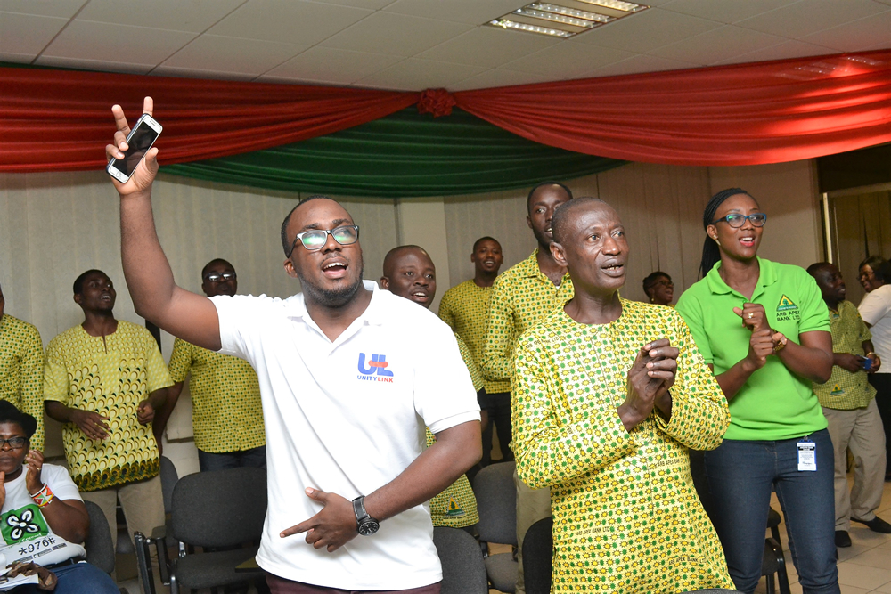 Staff in vibrant praises mood during the church service